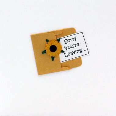 A lovely handmade Sorry You're Leaving Card, clever design incorporates a sunflower, 3d embellishments, handmade in Ireland