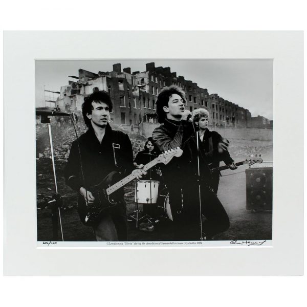 U2 Gloria mounted photo, taken by Colm Henry, Hot Press Photographer, during the demolition of Summerhill, Dublin 1981