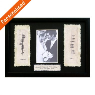 Ogham 50th Wedding Anniversary gift made in Ireland. Photo frame with couples' names written in Ogham on handmade paper in a slim black frame