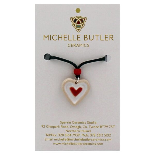 Small Ceramic Heart Necklace, stoneware clay decorated with white a red glaze, handcrafted by Michelle Butler in Ireland