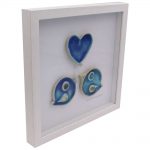 Love Birds, 2 ceramic birds and one ceramic heart in a lovely white frame. Made in Ireland