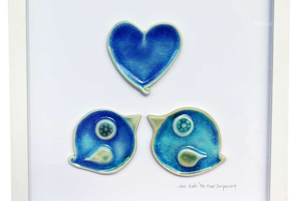 Love Birds, ceramic heart and two love birds in a white wooden frame, made in Ireland
