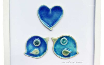 Love Birds, ceramic heart and two love birds in a white wooden frame, made in Ireland