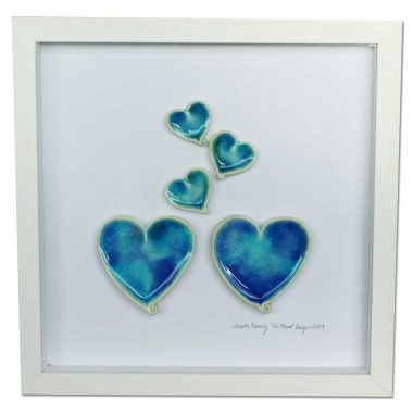 hearts family ceramic hearts in a white frame, designed and made in Ireland