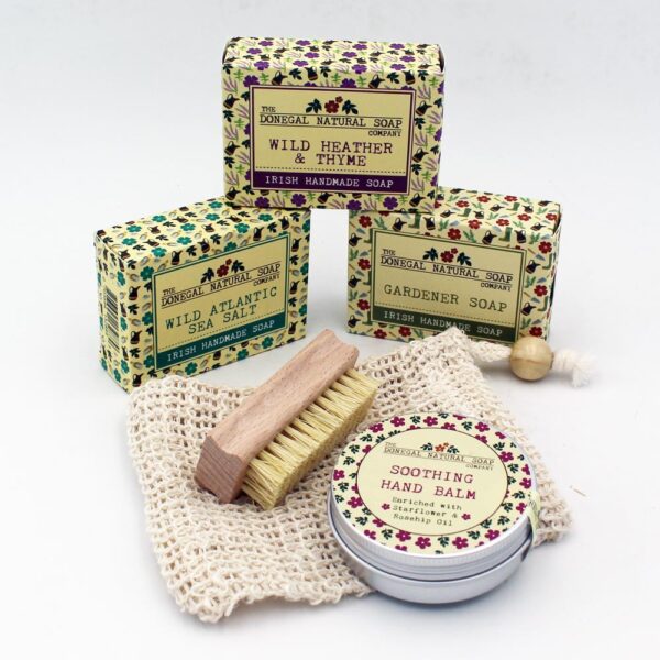 Natural soap handmade in Ireland. Set of 3 bars of soap, tin of hand balm, nail brush and jute soap pouch. Handmade soaps and balm by The Donegal Natual Soap Company.