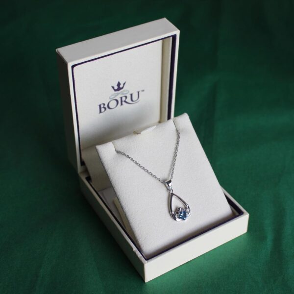 Claddagh Birthstone Blue Topaz Necklace in Boru presentation box
