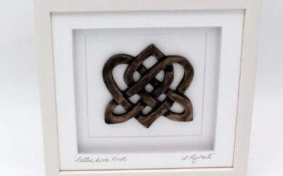 Celtic Love Knot in mounted creamy white frame, made in Ireland by Rynhart Bronze Fine Art